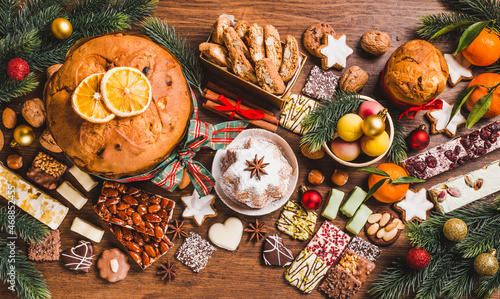 Christmas sweets background.Traditional Italian Christmas sweets on wooden background.