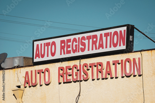 Old worn auto registration sign