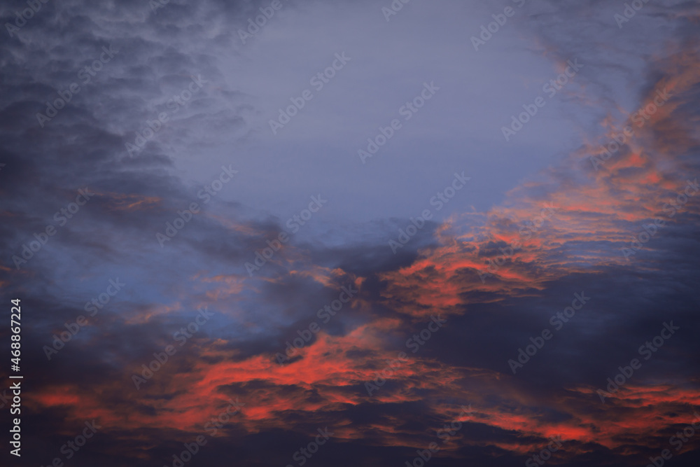 orange twilight light in the sky before sunset orange twilight light in the sky before sunset