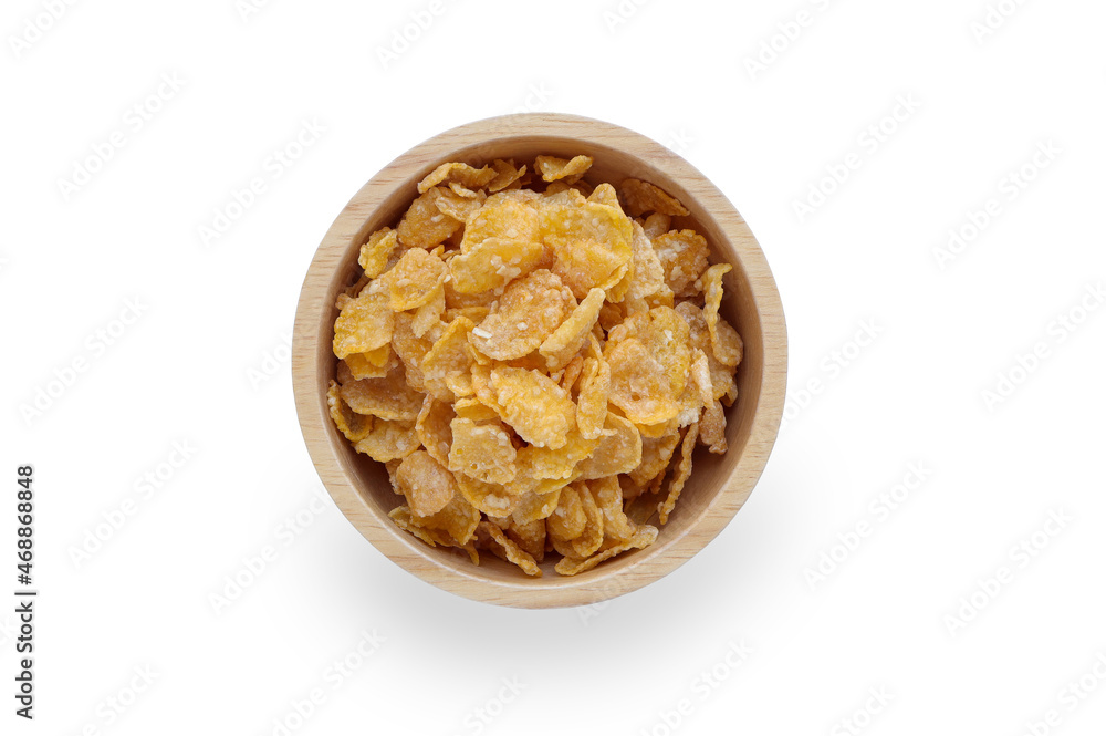 Cereal corn flakes in wooden bowl on white background with clipping path. Tasty cornflakes