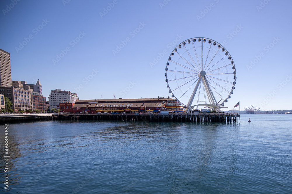 Seattle, Washington, USA - June 4 2021: The Seattle Great Wheel during summer. View from Seattle Aquarium.