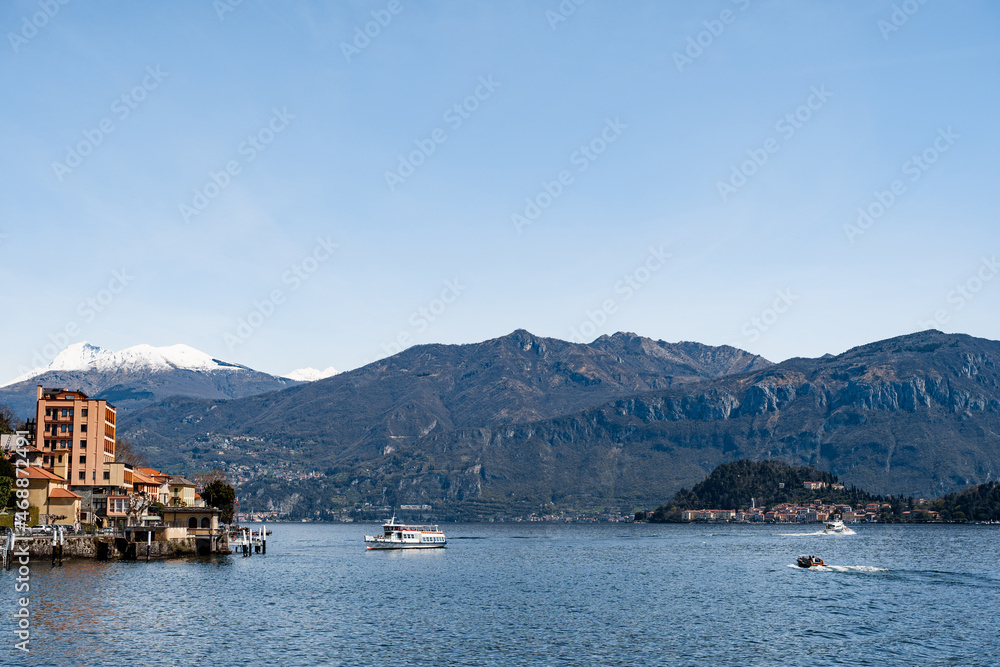 Ferry sails to the coast. Lake Como, Italy