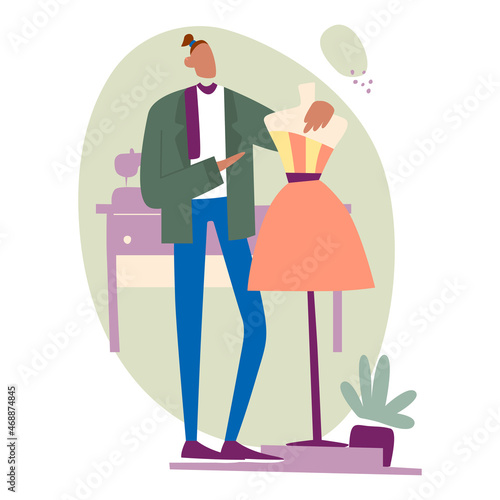 Man stands with a mannequin, fashion designer