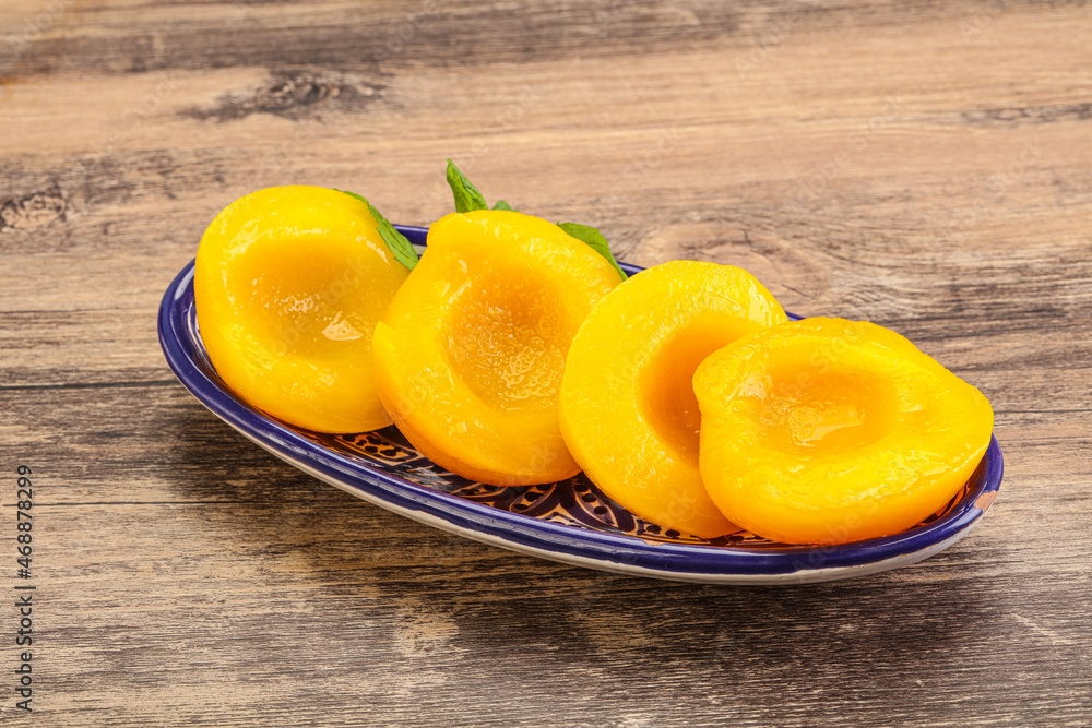 Sweet ripe canned peaches with mint Sweet ripe canned peaches with mint