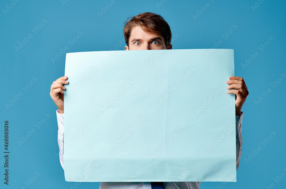 businessmen with blue mockup poster sign copy-space blue background businessmen with blue mockup poster sign copy-space blue background