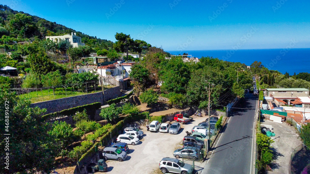CAPRI, ITALY - JUNE 17, 2021: Parked cars at the bus station in Anacapri.