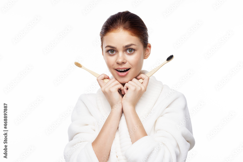 contact woman in white robe toothbrushes bathroom hygiene contact woman in white robe toothbrushes bathroom hygiene