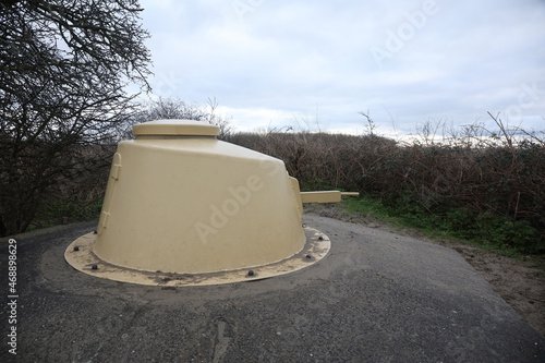 A German bunker with gun turret from the second  World War in the province Zuid-Holland, the Netherlands photo