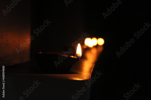 Artistic homemade clay oil lamps or karthikai deepam are in diwali and karthikai festivals in home photo