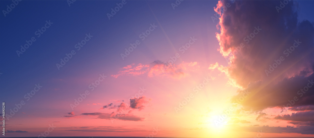 Pink-purple cloudy sky at sunset. Sky texture. Abstract nature background