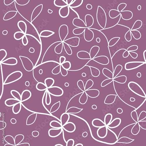 Seamless pattern of abstract flowering plants on a purple background for textile.