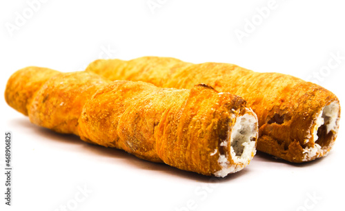 Puff cream Rolls on white background with selective focus