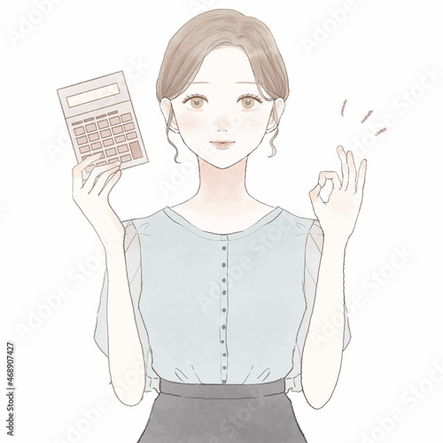 電卓を持ってOKサインを出している女性