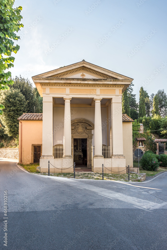 Fototapeta premium View at the Church of Madonna delle Neve in the streets of Lari - Italy