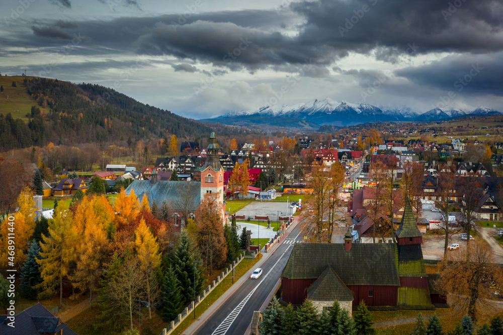 The autumn landscape of Bialka Tatrzanska village with a view of the Tatra Mountains. Poland