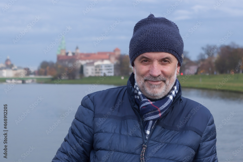 Portrait of a mature man on the upper deck of a boat on the Vistula River in Krakow Portrait of a mature man on the upper deck of a boat on the Vistula River in Krakow