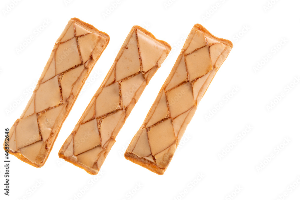 Cookie Sfogliatine, glazed puff pastry biscuits. Italian dessert isolated on white , top view, copy space Cookie Sfogliatine, glazed puff pastry biscuits. Italian dessert isolated on white , top view, copy space