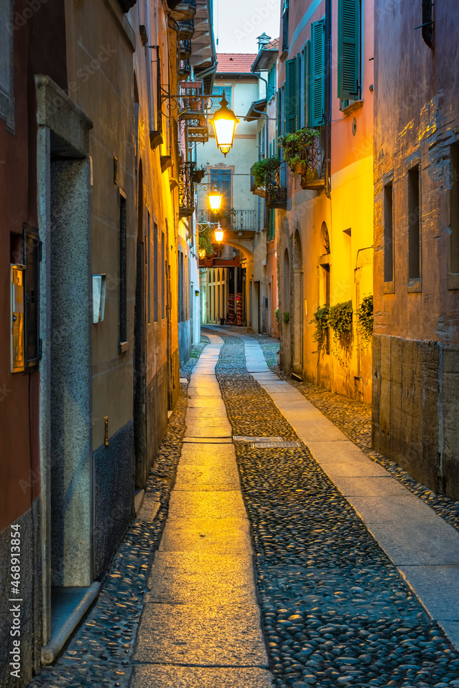 Fototapeta premium Old street of Orta village, on the same name lake shores (Piedmont Region, Northern Italy). It has a little island (UNESCO Site) home of a cloistered nuns convent.