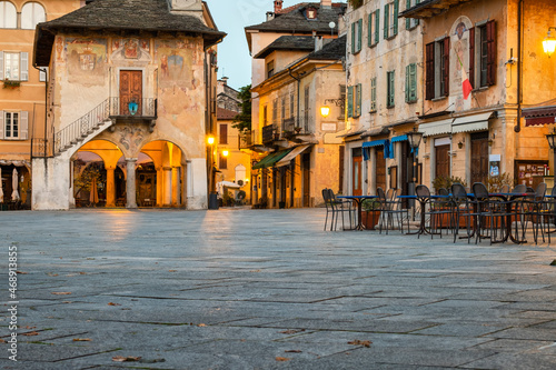 The Motta square of Orta village, on the same name lake shores (Piedmont Region, Northern Italy). It has a little island (UNESCO Site) home of a cloistered nuns convent. photo