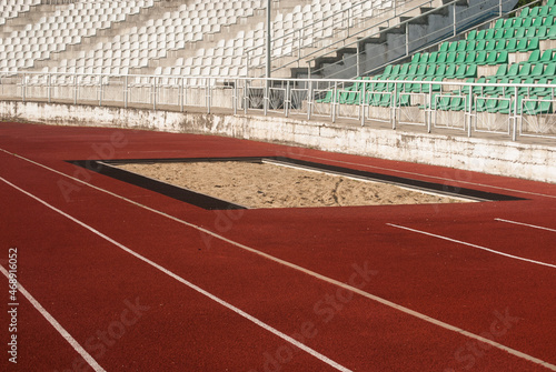 Athletic track red surface and sand trap for long Jump and triple Jump