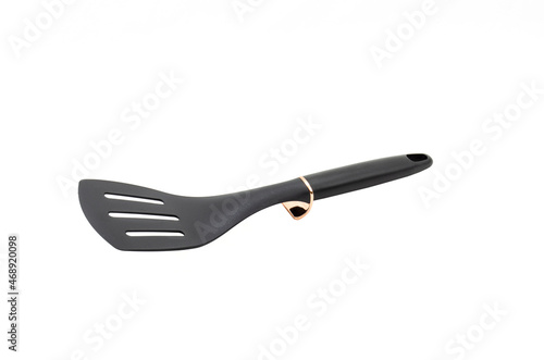 Black silicone spatula isolated on white background