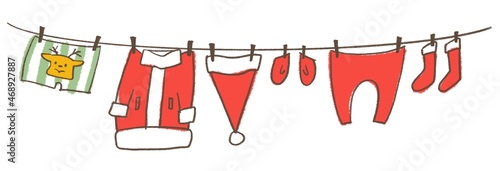 サンタさんの衣装が洗濯して干されているイラスト