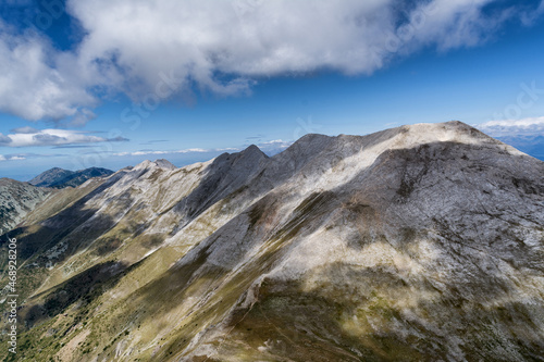 View from Vihren peak to Koncheto and the peaks of Pirin mountain in Bulgaria - Kutelo and Banski Suhodol photo