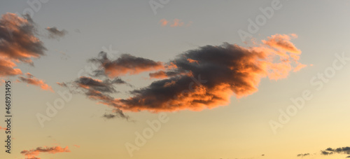 Glowing sky at dusk on a fall evening. Banner  panoramic.