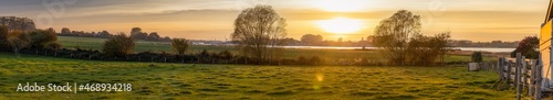 Panorama-Blick von Kopperby bei Kappeln über eine Weide und die Schlei nach Arnis im Sonnenuntergang im Oktober 2021 photo