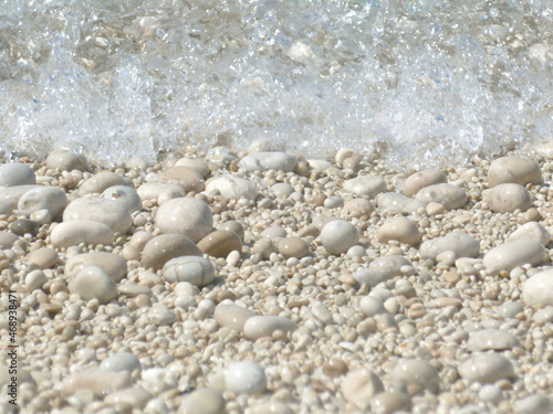 bright white pebble,  completely washed stones at the coast of lefkada - egremni beach - greek