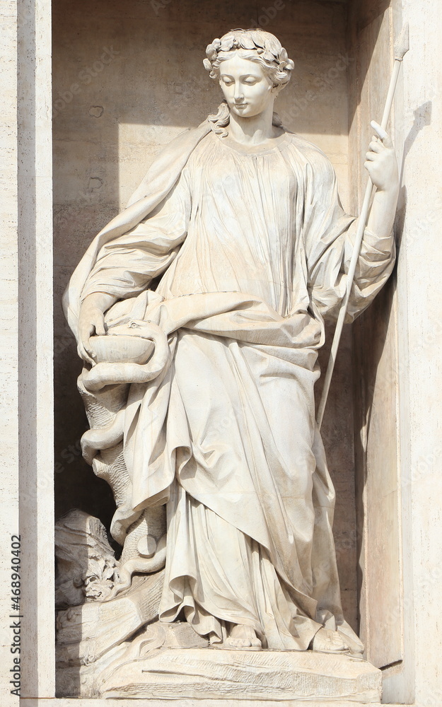 Φωτογραφία Trevi Fountain Detail with Statue of a Woman Representing Salubrity in Rome, Ita