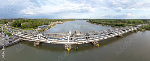 Aerial panorama shot of Temse bridge over the river Scheldt in Antwerp. Drone aerial view from above photo