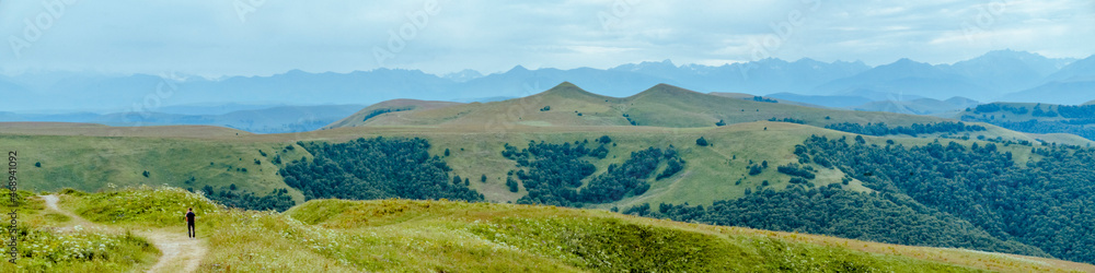 Panorama Mountain view, North Ossetia, Russia. Impenetrable rocks, majestic mountains and forests.