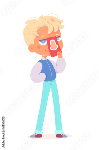 Boy learning sight sensory sense, holding card with human nose in hand, studying scent sense
