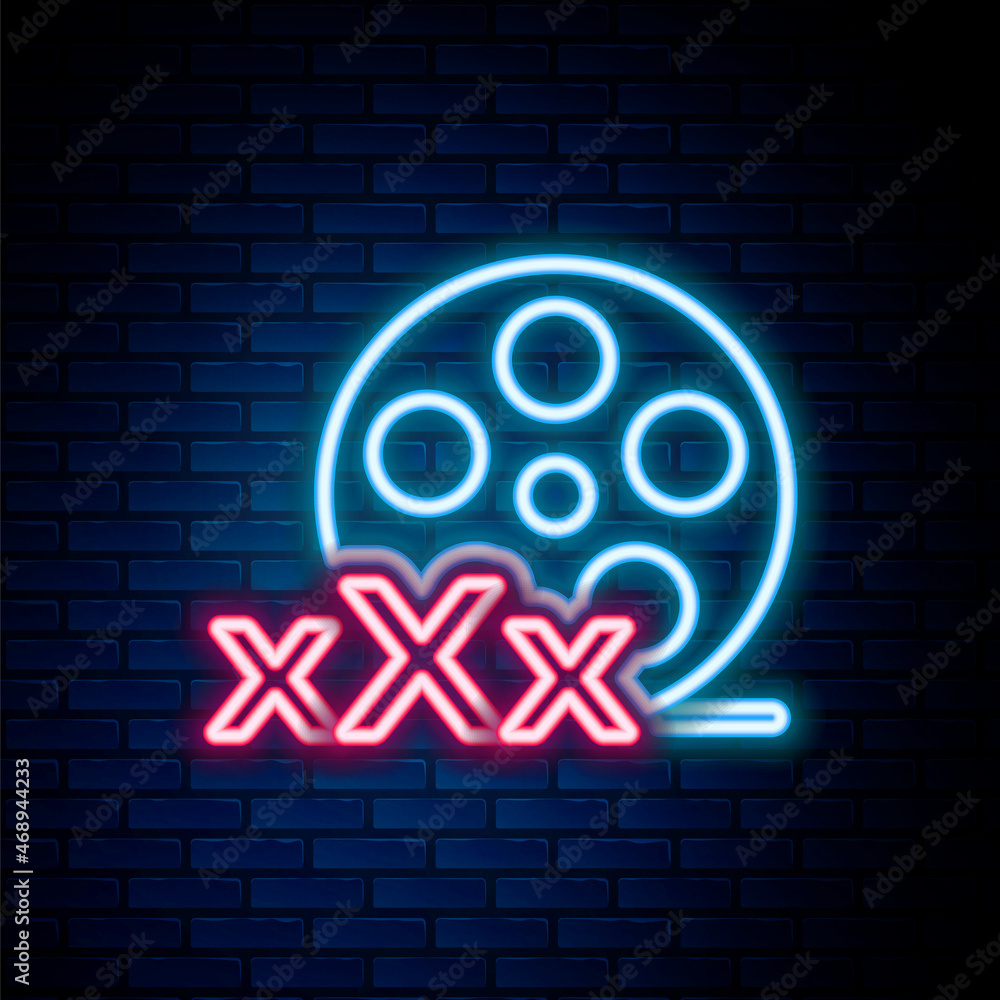 Glowing neon line Film reel with inscription Sex icon isolated on brick wall background. Age restriction symbol. 18 plus content sign. Adult channel. Colorful outline concept. Vector