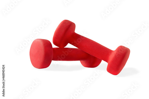 Red dumbbells for fitness on the white background