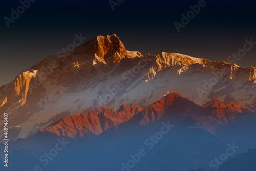 Sunrise on Chaukhamba , a mountain massif in the Gangotri Group of the Garhwal Himalaya. It lies at the head of the Gangotri Glacier at Uttarakhand, India. photo