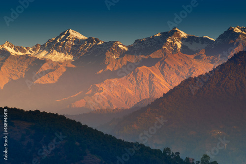 Sunrise on Chaukhamba , a mountain massif in the Gangotri Group of the Garhwal Himalaya. It lies at the head of the Gangotri Glacier at Uttarakhand, India.