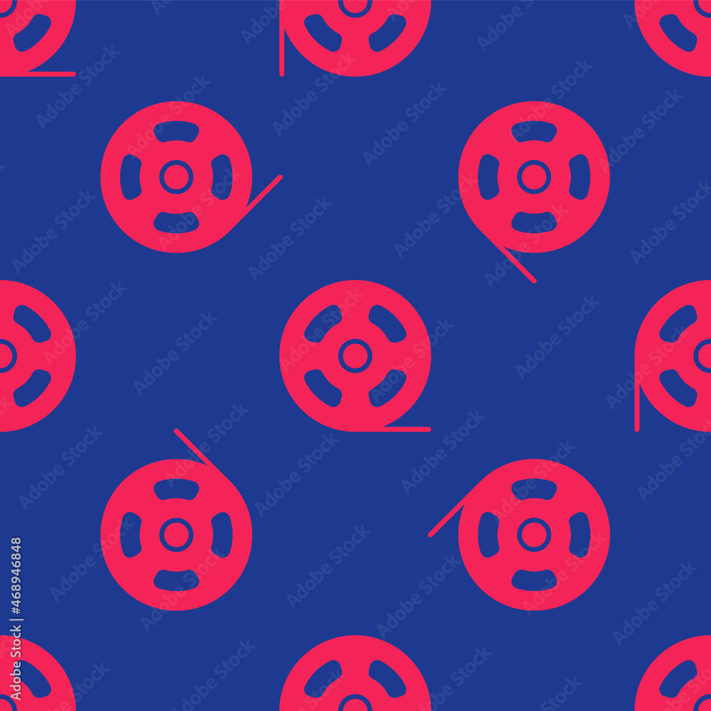 Naklejka premium Red Film reel icon isolated seamless pattern on blue background. Vector