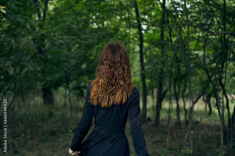 cheerful woman witch in the forest posing fantasy cheerful woman witch in the forest posing fantasy