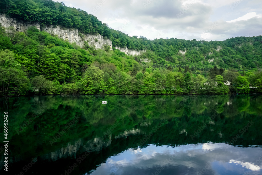 Mountain lake with reflection in the Caucasus Mountain lake with reflection in the Caucasus