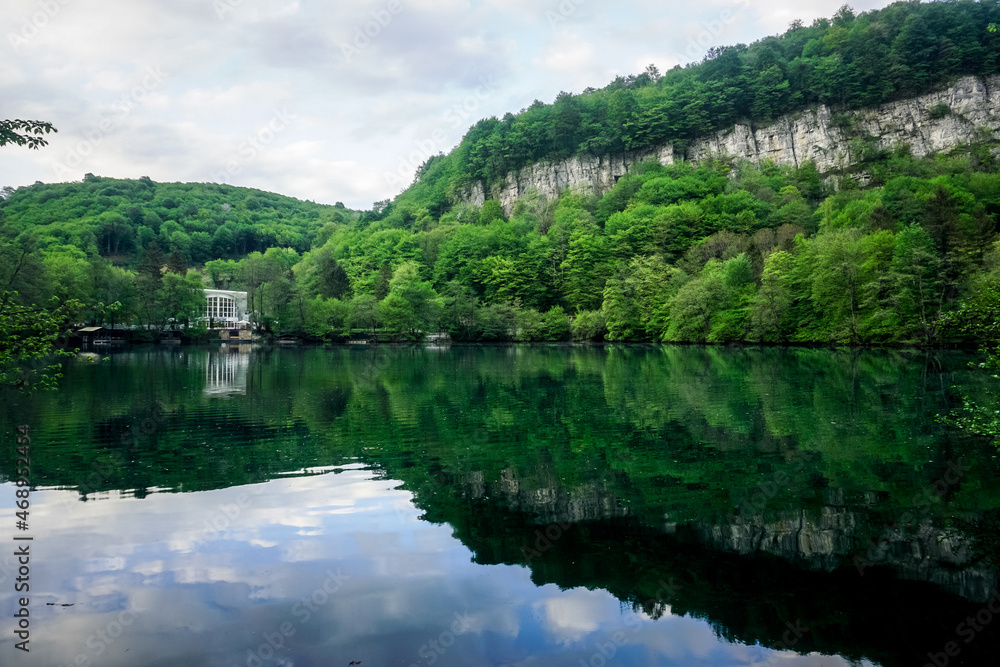 Mountain lake with reflection in the Caucasus