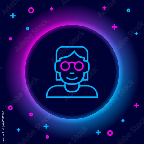 Glowing neon line Hacker or coder icon isolated on black background. Programmer developer working on code, coding, testing, debugging, analysing. Colorful outline concept. Vector