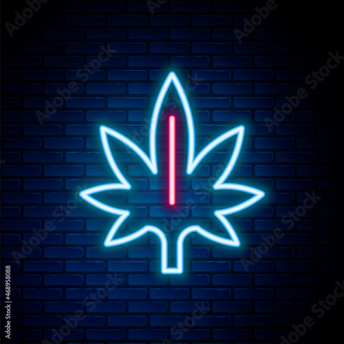 Glowing neon line Medical marijuana or cannabis leaf icon isolated on brick wall background. Hemp symbol. Colorful outline concept. Vector