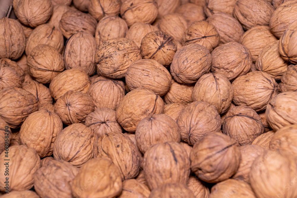 close up of walnuts in the shell close up of walnuts in the shell