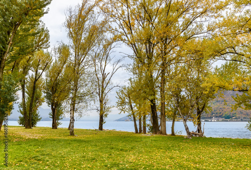 Beach of the Giona Park in Maccagno in the autumn season, Maccagno Inferiore, province of Varese, Italy photo