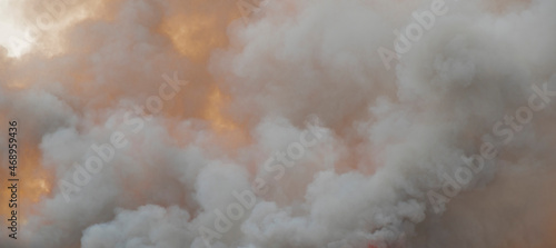 Fotografiet smoke pattern background of fire burn in grass fields