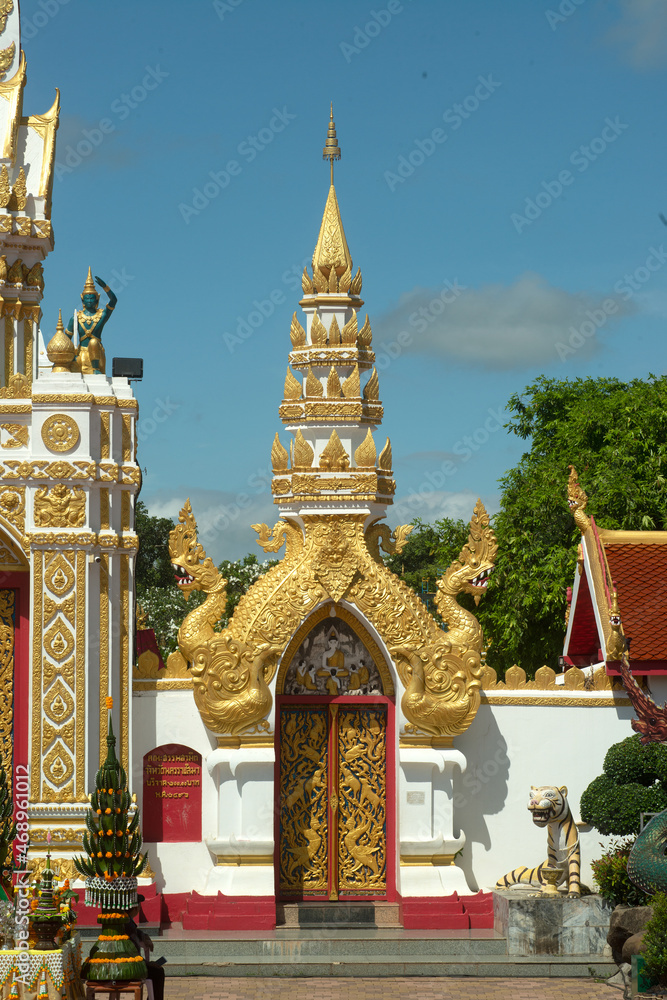 Fototapeta premium Entrance door located in Wat Phra That Phanom Woramahawihan , the Sacred Religious Site of the Northeast Relics representing the Buddhist prosperity of Nakhon Phanom since ancient time.