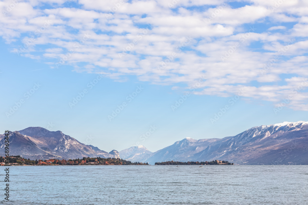 View of Lake Garda surrounded by the Alps in autumn