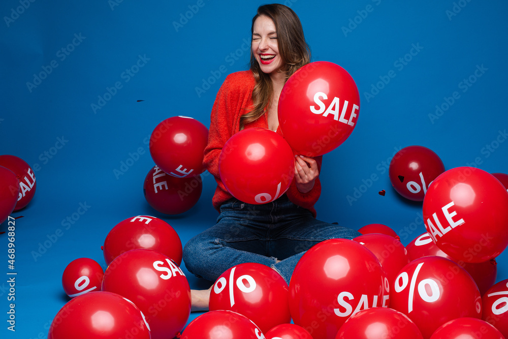 custom made wallpaper toronto digitalHappy young woman surrounded by balloons with discount stickers